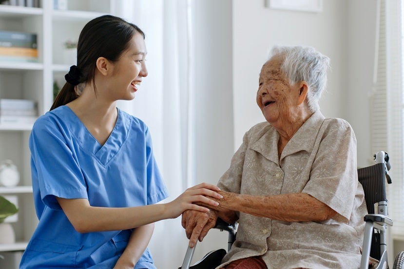 Asian caregiver with asian patient